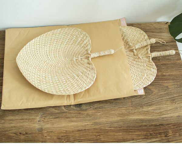 Peach-shaped raffia hand fan, straight shank