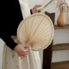 Handmade raffia palm fan