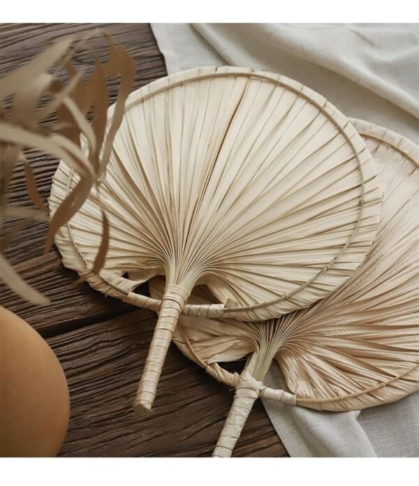 Handmade raffia palm fan