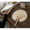 Handmade raffia palm fan